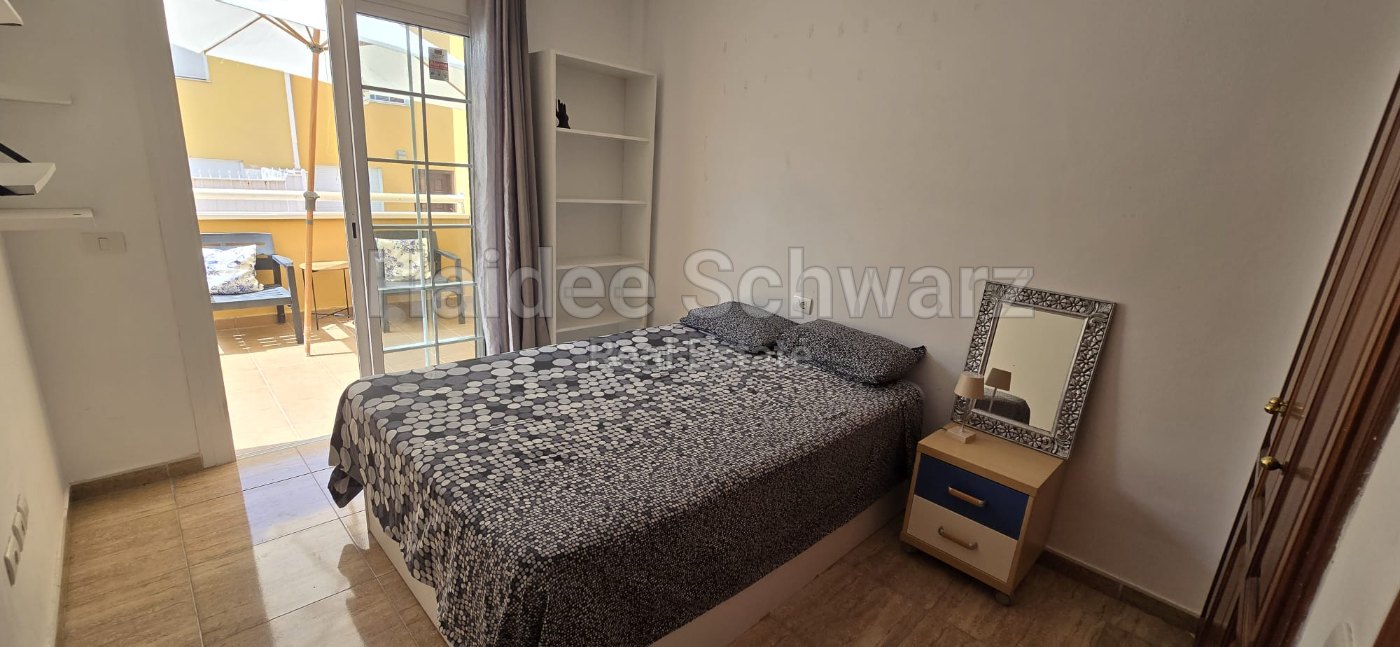 Room with private terrace in a three-storey house